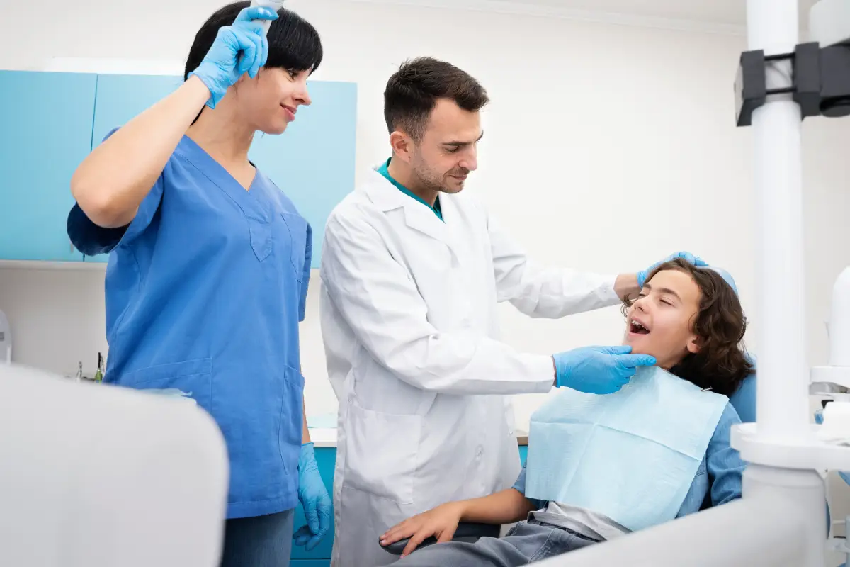 Dentist consulting with a patient